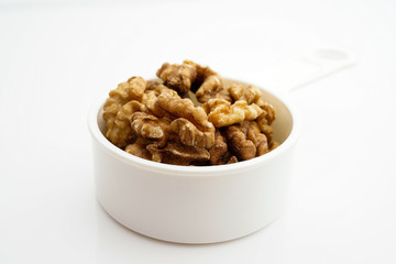 Walnut kernels isolated on white background
