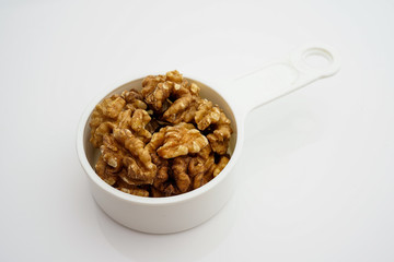Walnut kernels isolated on white background