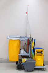 Closeup of janitorial, cleaning equipment and tools for floor cleaning. Vertical view.
