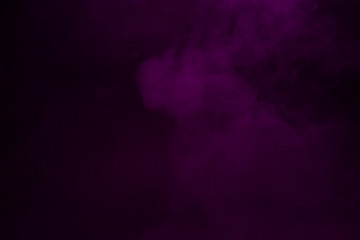Colorful smoke close-up on a black background