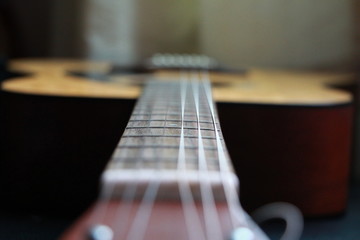 acoustic guitar on the table