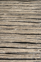 Fototapeta premium Mossy planks of wood of the boardwalk leading through the Plitvice Lakes National Park, Croatia