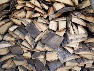  Cut wood for the fireplace. Firewood logs.