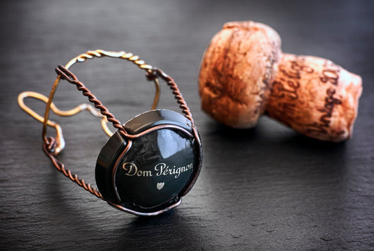Tambov, Russian Federation - August 19, 2018 Dom Perignon Champagne cork and muselet with cap on black background. Studio shot.