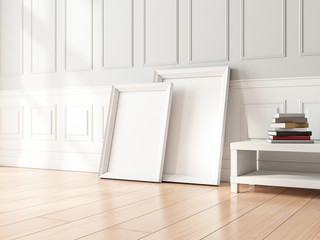 Two white Frames Mockup standing near wall indoors