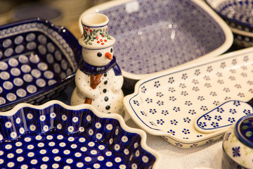 Christmas souvenirs on the counter in Europe, Painted glass Christmas balls with fairy tales.