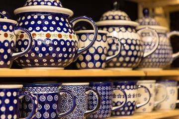 Christmas souvenirs on the counter in Europe, Painted glass Christmas balls with fairy tales.