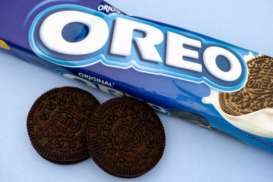 Tambov, Russian Federation - August 12, 2016 Oreo pack with two Oreo cookies on blue background. Studio shot.