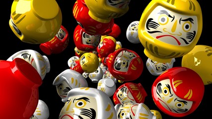 Daruma dolls on black background
