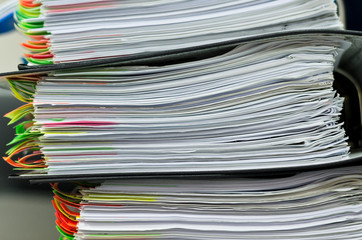 Extremely close up of the stacked office documents
