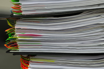 Extremely close up of the stacked office documents