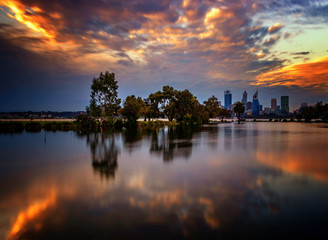 Mirror Image sunset cityscape, cloudy night