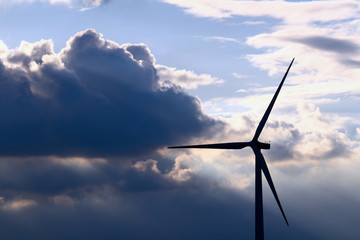 A wind power generator built in a dramatic sky