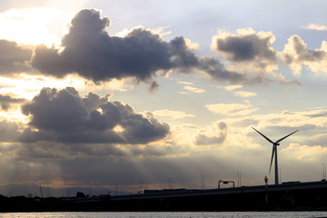 A wind power generator built in a dramatic sky