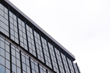 Wallpaper of abstract geometric design glass building with skyline