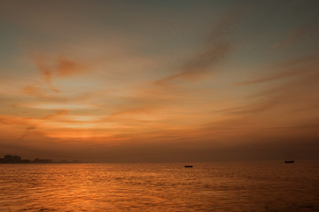 Fototapeta premium Sunrise and the empty boats at Hawksbay Karachi