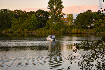 Fototapeta na wymiar Little Boat on the River Neckar near Besigheim