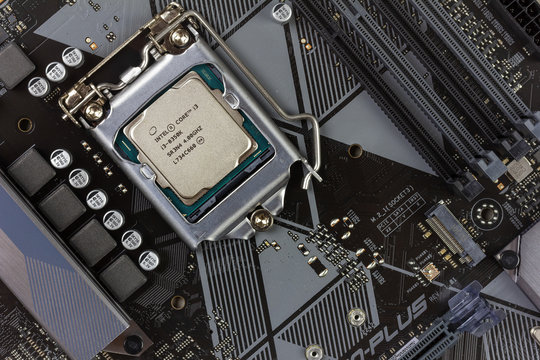 Maykop, Russia - November 9, 2018: intel core I3 desktop processor 8th gen on the motherboard Asus closeup top view