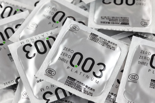 Tambov, Russian Federation - August 29, 2013 Okamoto 003 Platinum condoms.