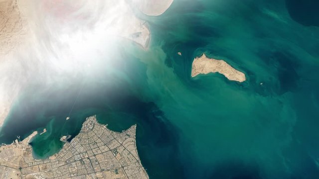 Aerial satellite view of longest world bridge in Kuwait bay, modern architecture engineering construction. Contains public domain image by Nasa