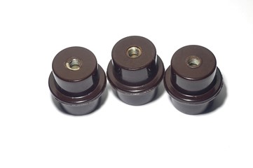 Close up a join nut insulators of a electricity.