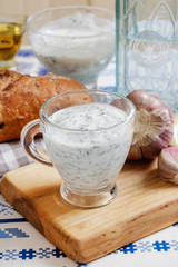 Greek Tzatziki yogurt sauce in a small sauceboat.