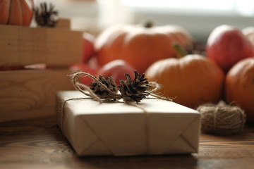 Gift boxes with pumpkins garlands holiday concept.