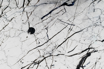 Black patterned natural of Marquina marble background for design.