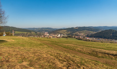 Fototapeta na wymiar Turzovka town with hilly surrounding in Slovakia during springtime morning