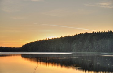 Fototapeta premium Sunset on the lake with mirror water and clean sky, fog. HDR photo shot 