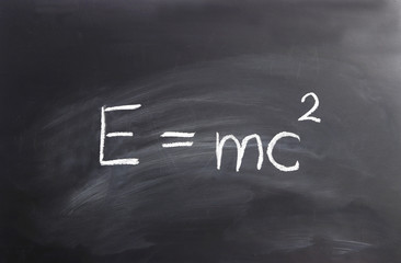 Einstein formula written on a chalkboard