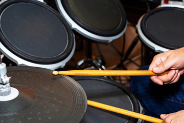 Musical instruments, hobby and music concept - Close up of electronic drum kit.