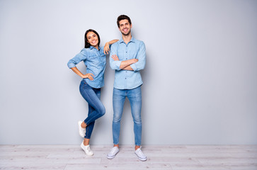 Full body photo of amazing pair in love working together get first promotion best team wear casual jeans clothes isolated grey color background