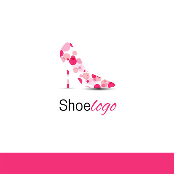 Shoe on a high heel with pink spots. Female shoe. Vector logo design template. Modern design
