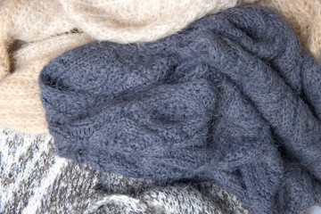 Fototapeta na wymiar Knitted color scarfs background
