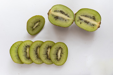 sliced ​​kiwi fruit on a white background