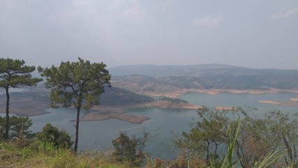 A normal mid day photo clicked while travelling to cherapunjee, India. Place was so quiet and peaceful. Assam is  known for lakes and forests 