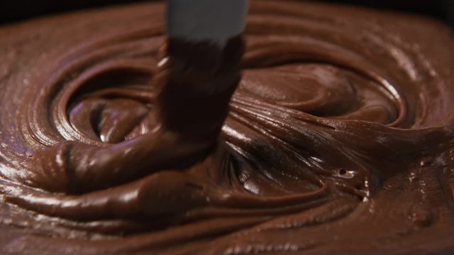 Making chocolate fudge at candy factory