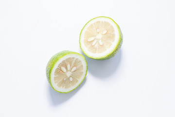 halves of lime on a white background stylization