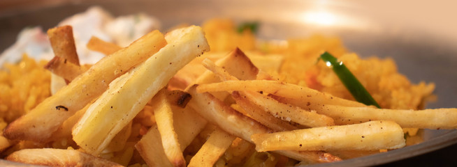 Yellow rice with Potato chip (French fries ) , Indian veg rice biryani