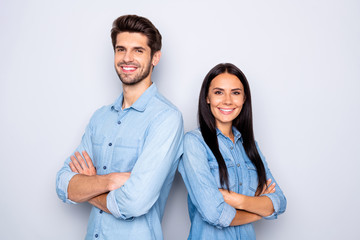 Close-up portrait of his he her she nice attractive cheerful cheery content couple partners leaders wearing casual folded arms standing back to back isolated over light white pastel color background