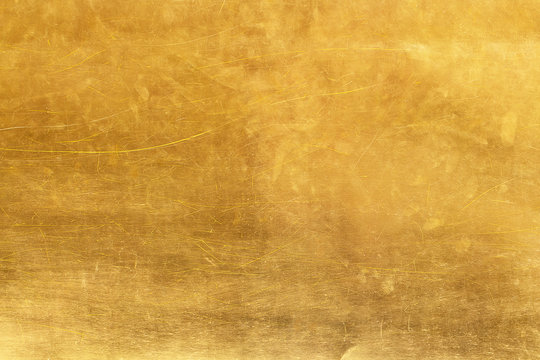 Gold abstract background or texture distress  scratch and gradients shadow