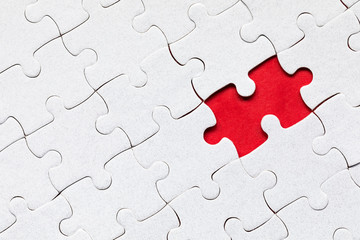 Jigsaw puzzle with missing piece. Missing puzzle pieces. Concept image of unfinished task. Completing final task, missing jigsaw puzzle pieces and business concept with a puzzle piece missing.