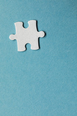Closeup of jigsaw puzzle isolated. Missing jigsaw puzzle piece, business concept for completing the...