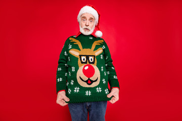 Photo of santa granddad showing ugly deer ornament pullover dressed on himself not understand idea...