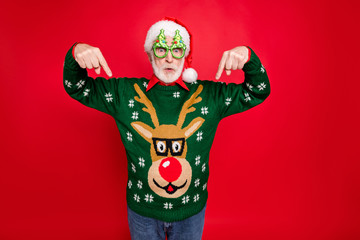 Photo of santa looking on low x-mas shopping prices indicate fingers on cheap jumper wear x-mas...