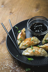 Asian fried dumplings with soy sauce