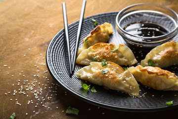 Asian fried dumplings with soy sauce