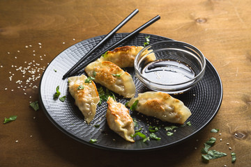 Asian fried dumplings with soy sauce