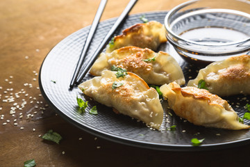 Asian fried dumplings with soy sauce